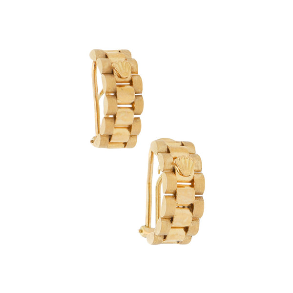 Aretes diseño especial en oro amarillo 18 kilates.