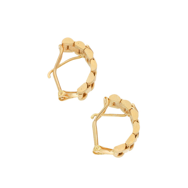 Aretes diseño especial en oro amarillo 18 kilates.