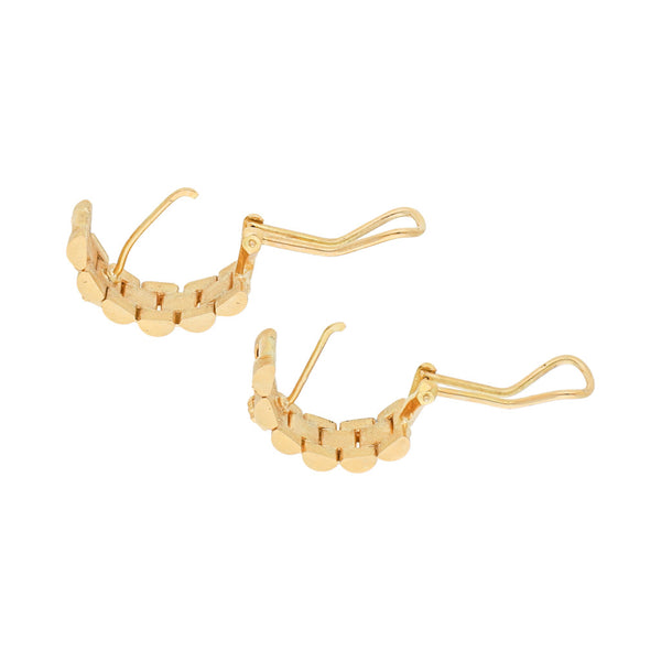 Aretes diseño especial en oro amarillo 18 kilates.