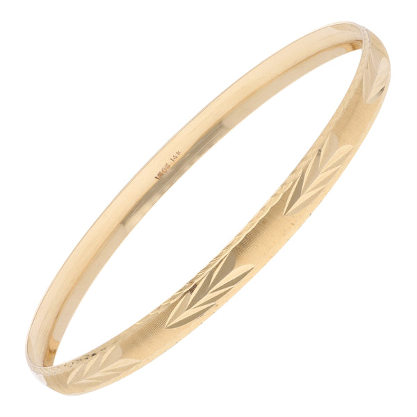 Pulsera de arillo facetada en oro amarillo 14 kilates.