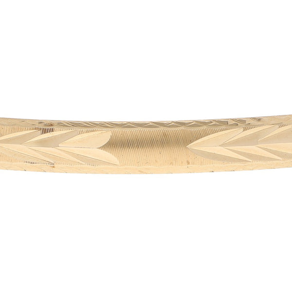 Pulsera de arillo facetada en oro amarillo 14 kilates.