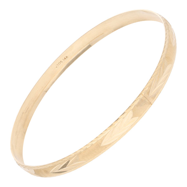Pulsera de arillo facetada en oro amarillo 14 kilates.