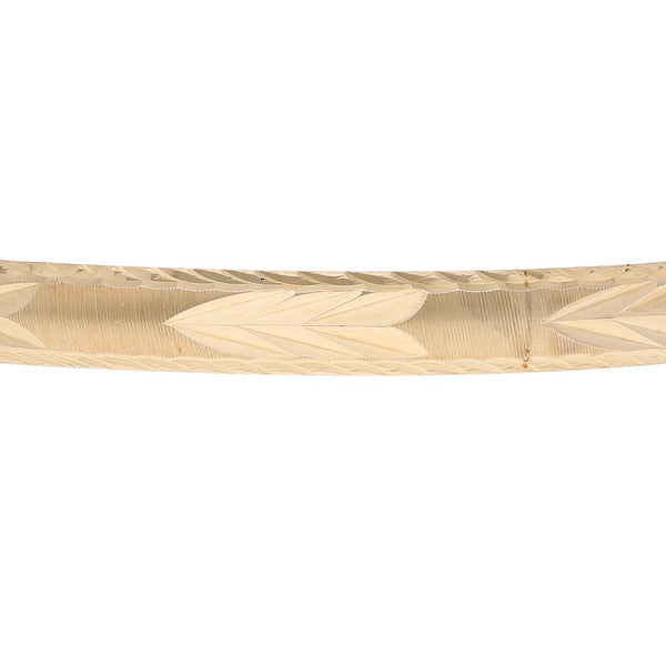Pulsera de arillo facetada en oro amarillo 14 kilates.