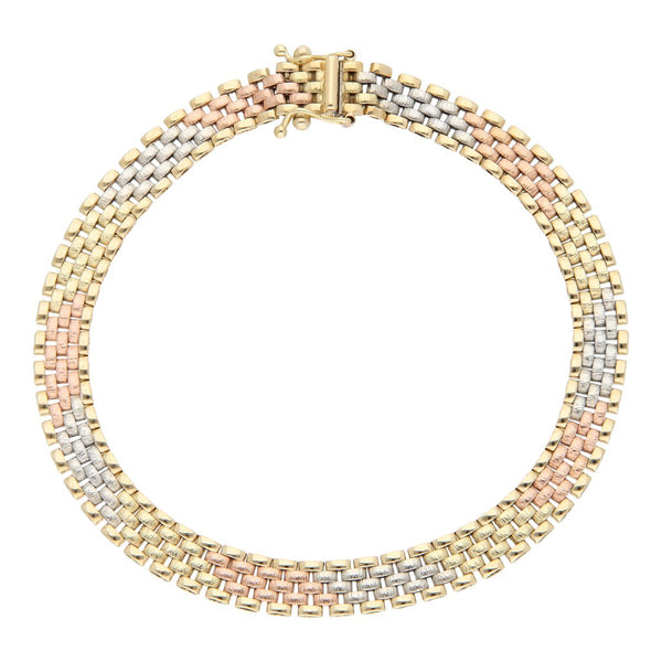 Pulsera eslabón articulado en oro tres tonos 14 kilates.