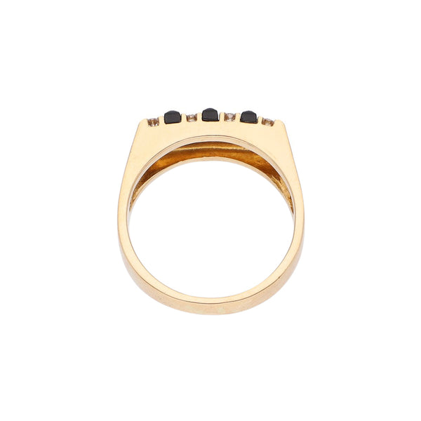 Anillo tipo sello con diamantes y ónix en oro amarillo 18 kilates.