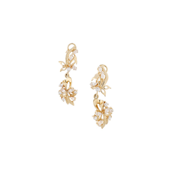 Aretes calados con sintéticos en oro amarillo 14 kilates.