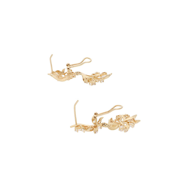 Aretes calados con sintéticos en oro amarillo 14 kilates.