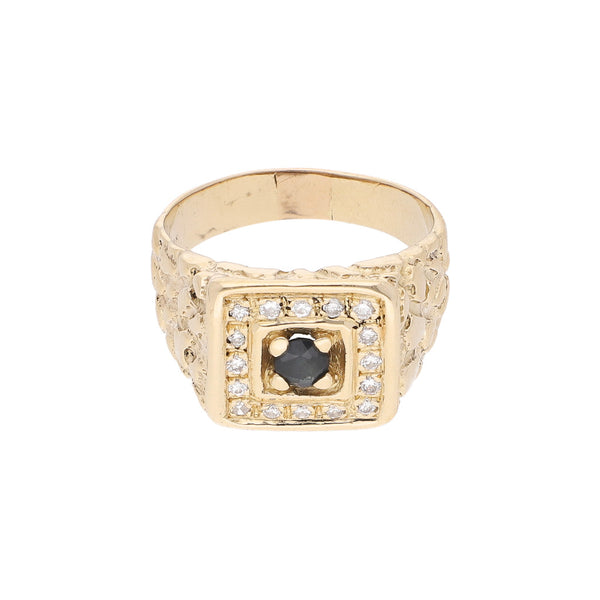 Anillo barroco con diamantes y zafiro en oro amarillo 14 kilates.