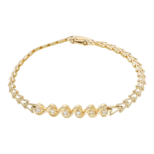 Pulsera eslabón articulado con diamantes en oro amarillo 14 kilates.