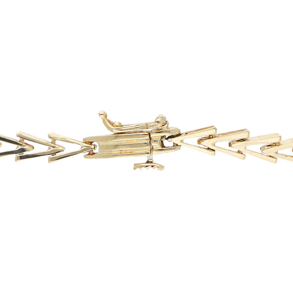 Pulsera eslabón articulado con diamantes en oro amarillo 14 kilates.