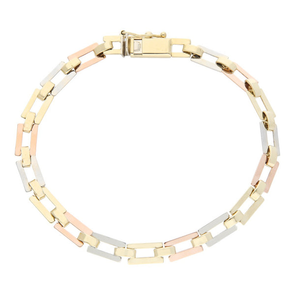 Pulsera eslabón articulado en oro tres tonos 14 kilates.