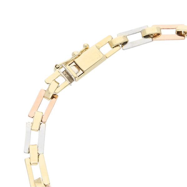 Pulsera eslabón articulado en oro tres tonos 14 kilates.