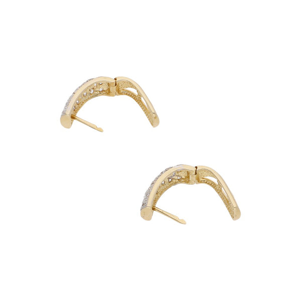 Arracadas articuladas motivo grecas con circonias en oro amarillo 14 kilates.