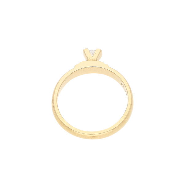 Anillo de compromiso con sintéticos en oro amarillo 14 kilates.