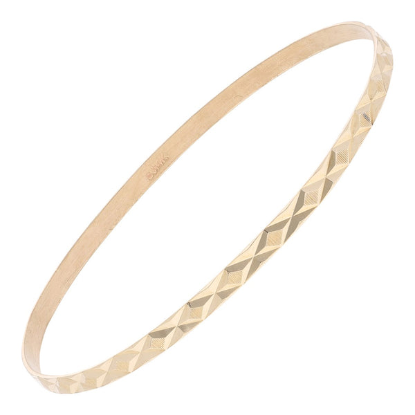Pulsera de arillo infantil facetada en oro amarillo 14 kilates.