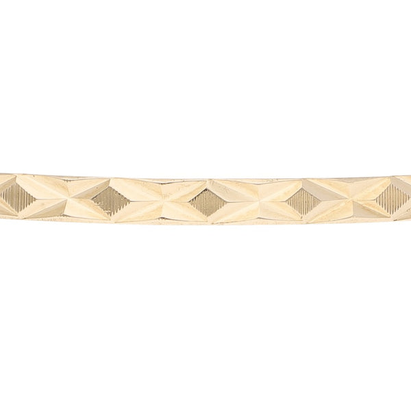 Pulsera de arillo infantil facetada en oro amarillo 14 kilates.