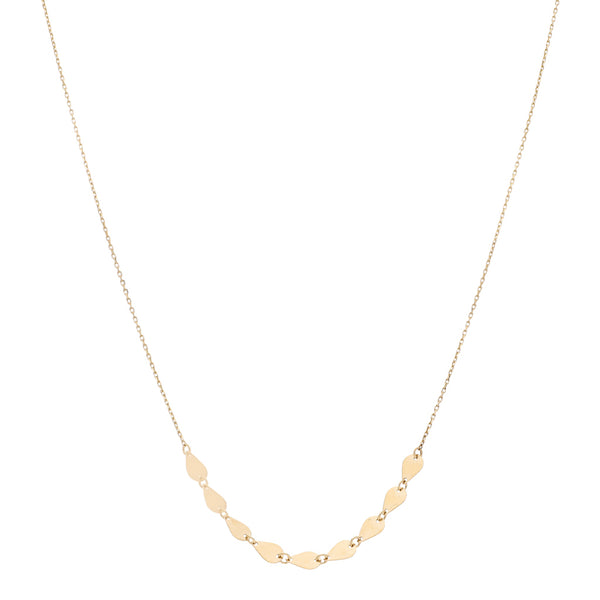 Collar eslabón cruzado con aplicaciones en oro amarillo 14 kilates.