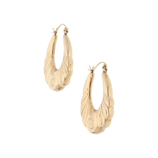 Arracadas huecas en oro amarillo 14 kilates.