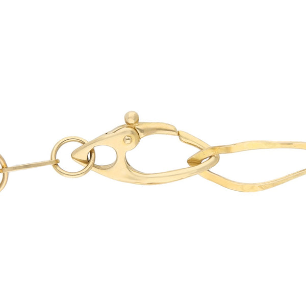 Pulsera de eslabón combinado en oro amarillo 14 kilates.