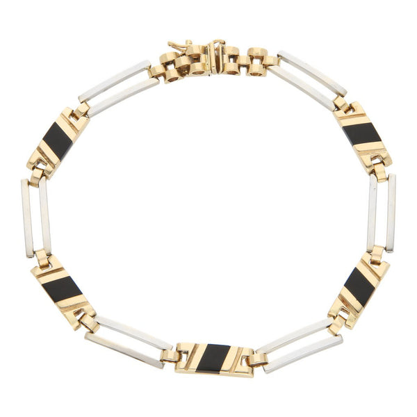 Pulsera eslabón articulado con sintéticos en oro dos tonos 14 kilates.