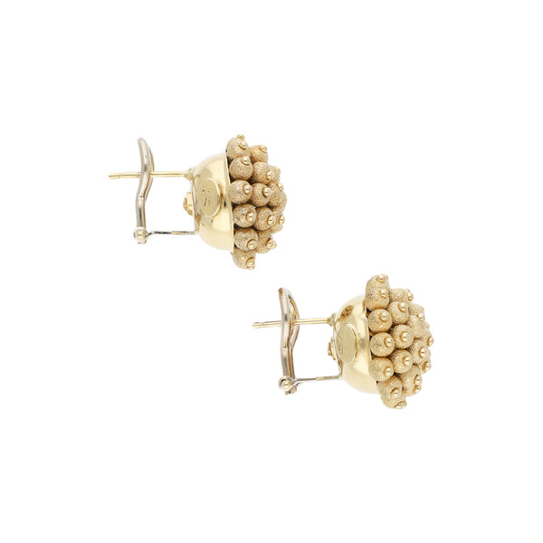 Aretes diseño especial en oro dos tonos 14 kilates.
