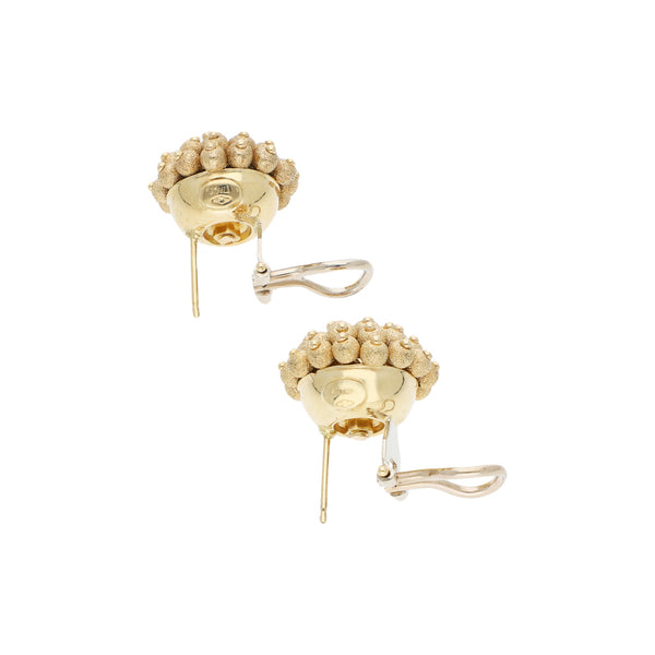 Aretes diseño especial en oro dos tonos 14 kilates.