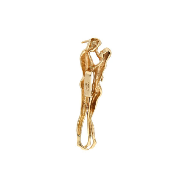 Dije diseño especial motivo pareja en oro amarillo 14 kilates.