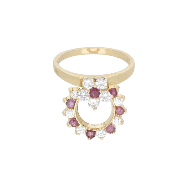 Anillo giratorio con rubíes y sintéticos en oro amarillo 14 kilates.