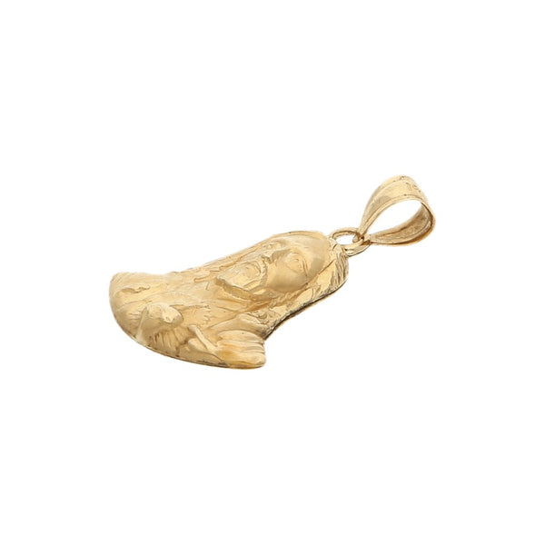 Medalla laminada motivo Sagrado Corazón en oro amarillo 14 kilates.