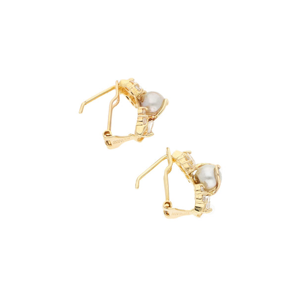 Aretes diseño especial con sintéticos y perla en oro amarillo 14 kilates.