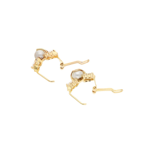 Aretes diseño especial con sintéticos y perla en oro amarillo 14 kilates.