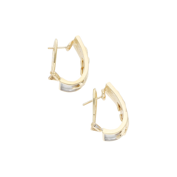 Aretes diseño especial platinado motivo felino en oro amarillo 14 kilates.