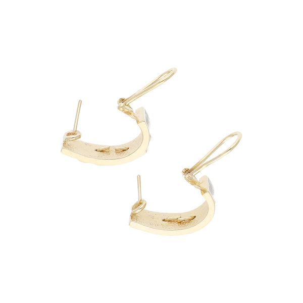 Aretes diseño especial platinado motivo felino en oro amarillo 14 kilates.