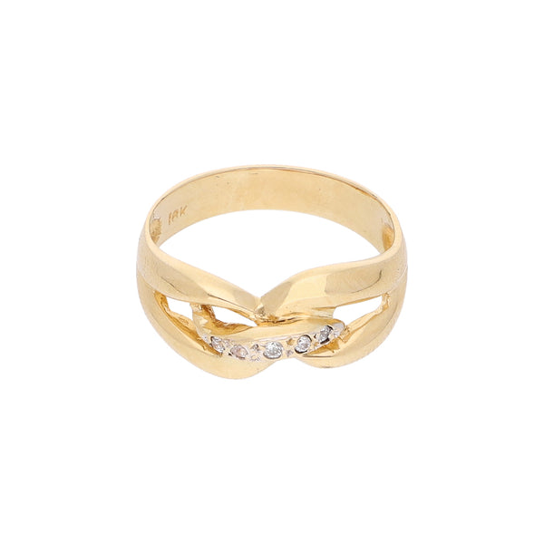 Anillo calado con sintéticos en oro amarillo 18 kilates.