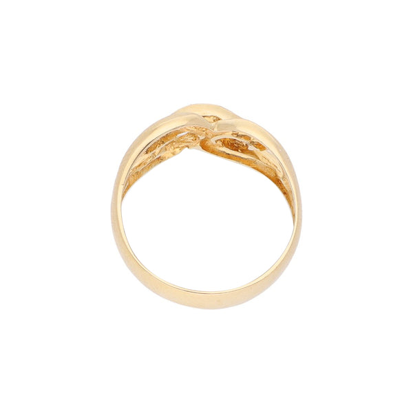 Anillo calado con sintéticos en oro amarillo 18 kilates.