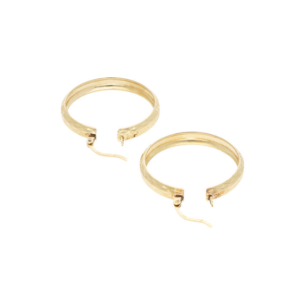 Arracadas facetadas en oro amarillo 14 kilates.