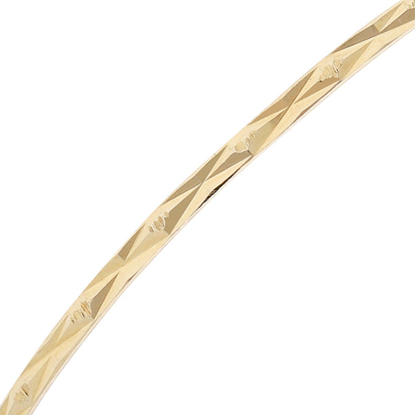 Pulsera de arillo facetada en oro amarillo 14 kilates.