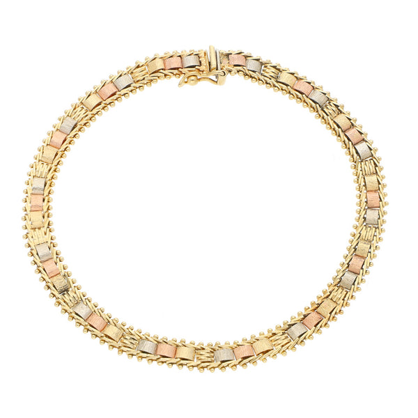 Pulsera eslabón boleado en oro tres tonos 14 kilates.