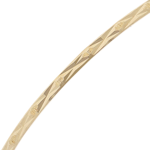 Pulsera de arillo facetada en oro amarillo 14 kilates.