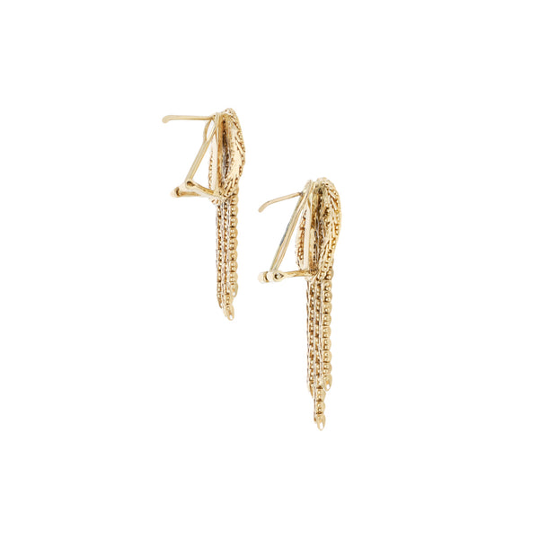 Aretes boleados en oro amarillo 14 kilates.