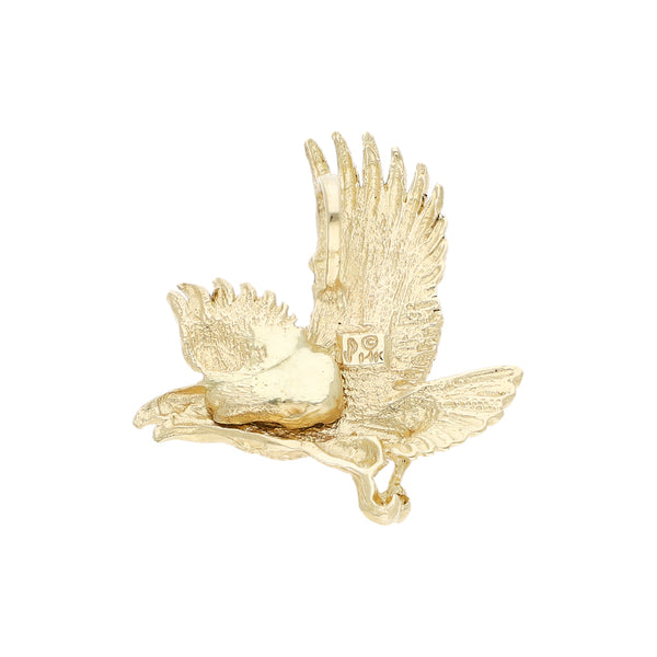 Dije diseño especial motivo águila en oro amarillo 14 kilates.