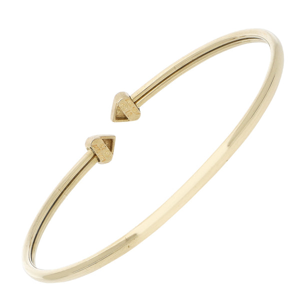 Pulsera de arillo abierta con aplicaciones motivo corazón en oro amarillo 14 kilates.
