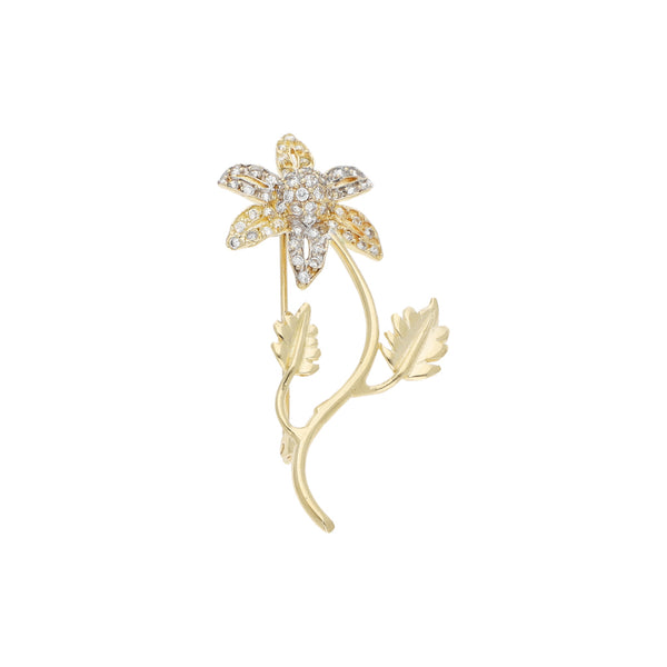 Prendedor diseño especial motivo flor con sintéticos en oro amarillo 14 kilates.