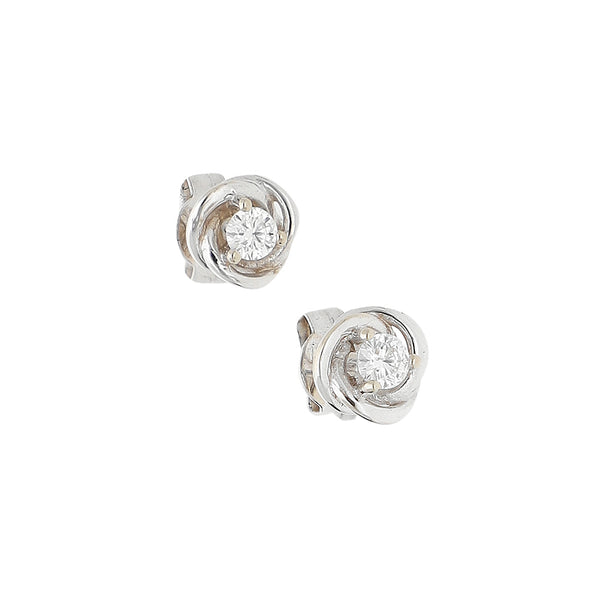 Broqueles diseño especial con diamantes en oro blanco 14 kilates.