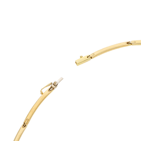 Juego de gargantilla y pulsera eslabón articulado con sintéticos en oro dos tonos 14 kilates.