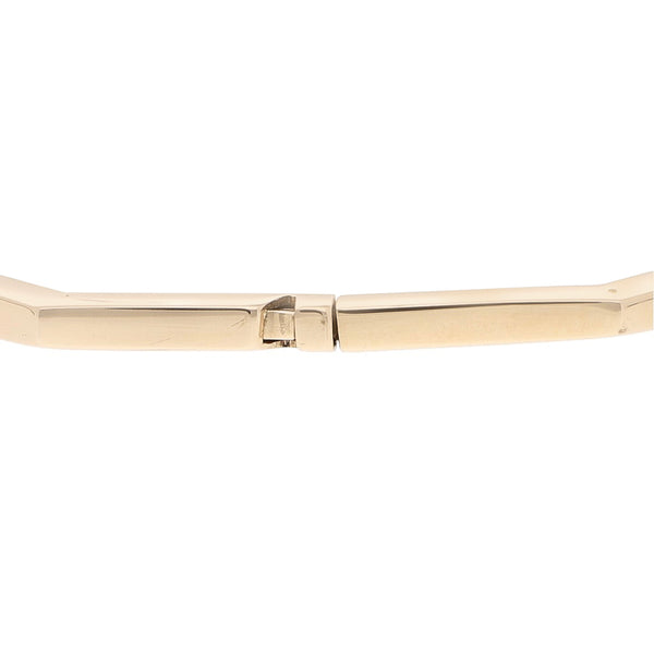 Pulsera de arillo articulada en oro amarillo 14 kilates.