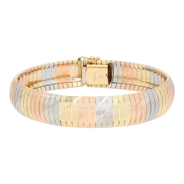 Pulsera eslabón articulado en oro tres tonos 14 kilates.