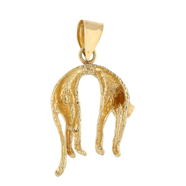 Dije diseño especial motivo felino en oro amarillo 14 kilates.