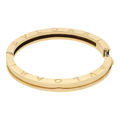 Pulsera de arillo articulada firma Bvlgari en oro amarillo 18 kilates.