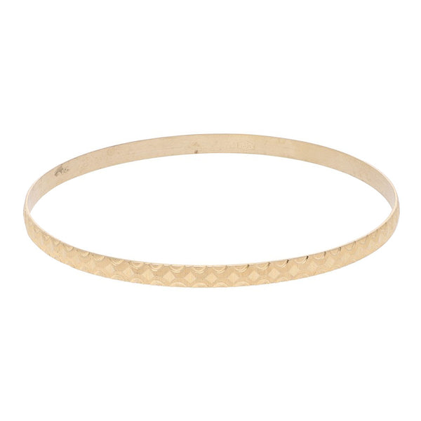 Pulsera de arillo facetada en oro amarillo 14 kilates.